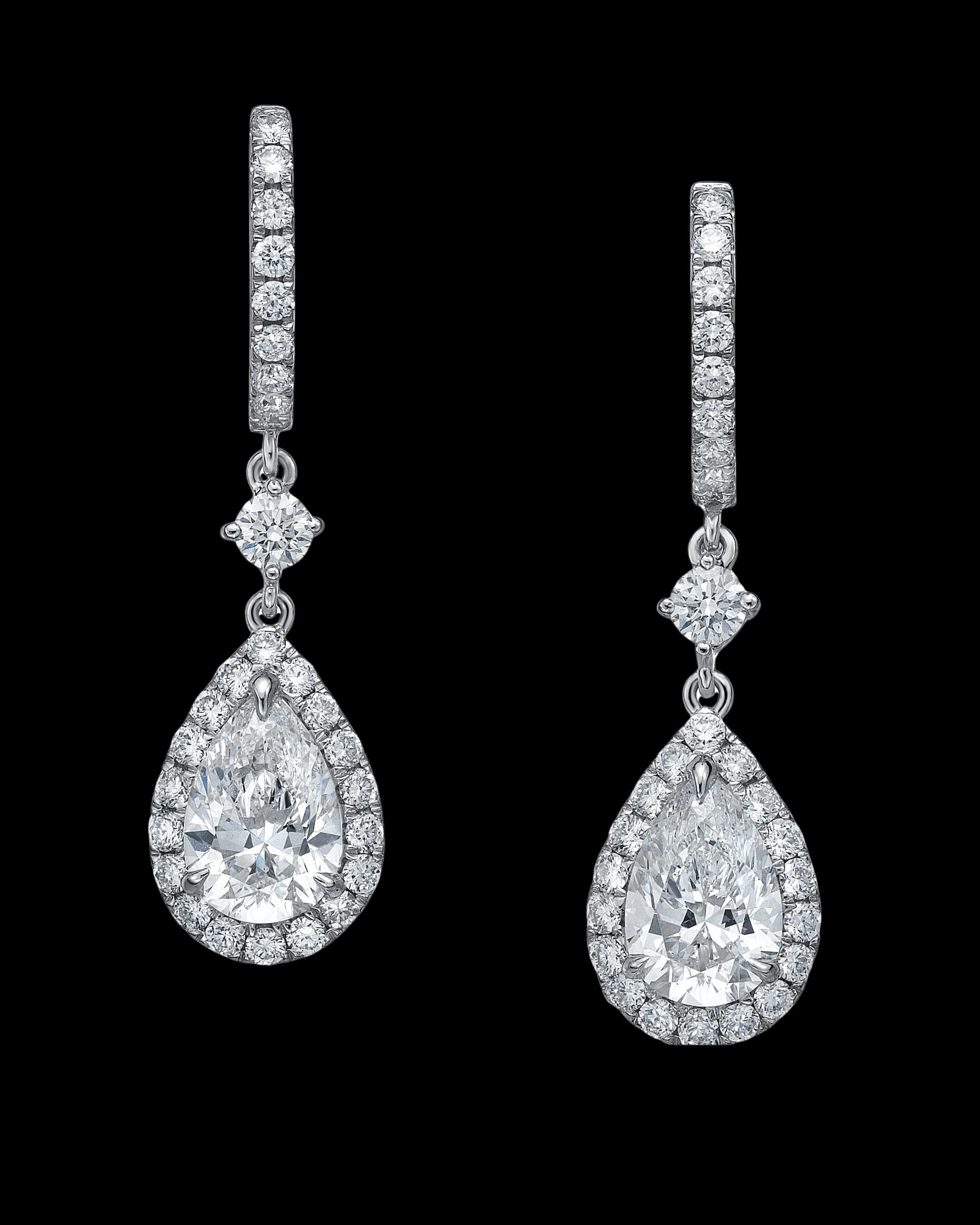 Tears of Joy white gold diamond earrings on white background